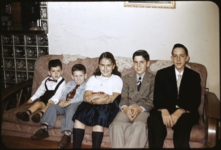 Me, my big brothers, and sister on basement couch where Ape Woman attacked